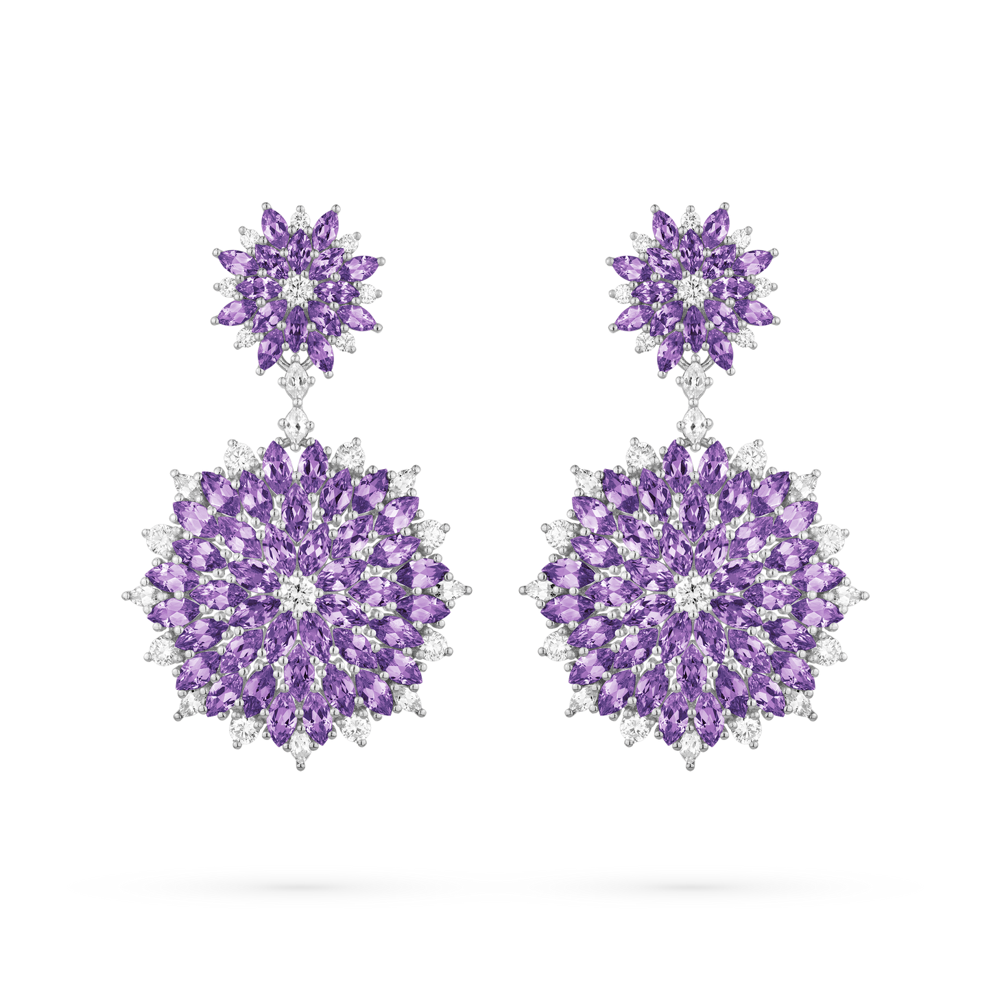 A pair of dahlia dangle earrings with blue and white patterns, resembling a floral design.